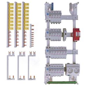 Ce tableau pré équipé IKEPE contient plus d'une vingtaine d'accessoires, peignes et disjoncteurs déjà installés sur les 4 rail DIN.